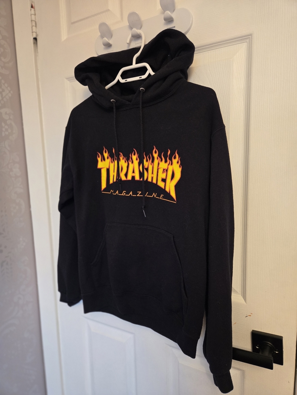 Thrasher Black Hoodie with Yellow-Orange Flame Logo